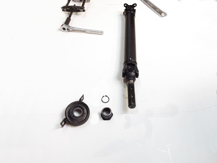 support is removed from the shaft with all other removed parts