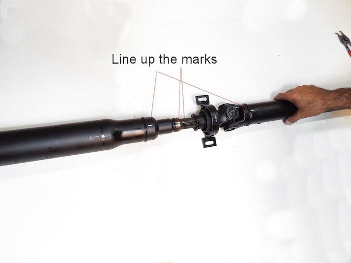 position marks are lined up on the driveshaft