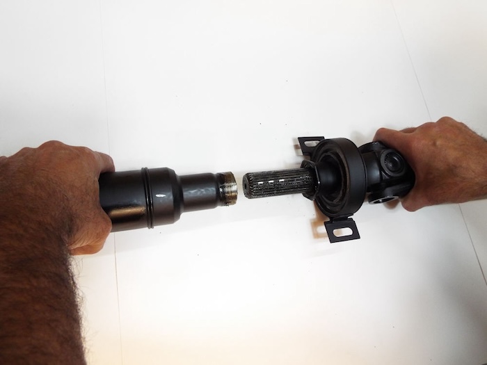 driveshaft is separated showing the slip yoke